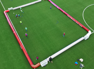 4v4 Inflatable Football Arena — Mid-Size Club Pitch (16x9m) — view 01 (AirPitchPro CE-certified inflatable, real product photo)
